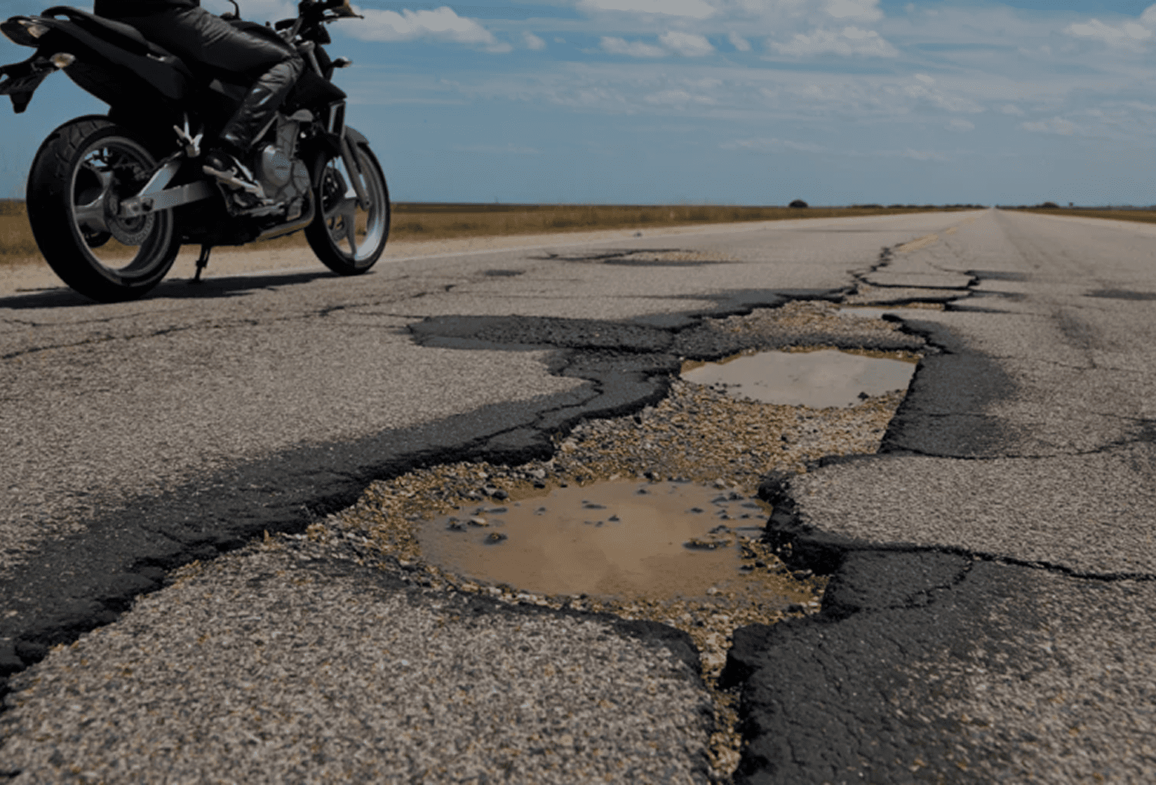Road hazards such as potholes,
debris, or poor pavement